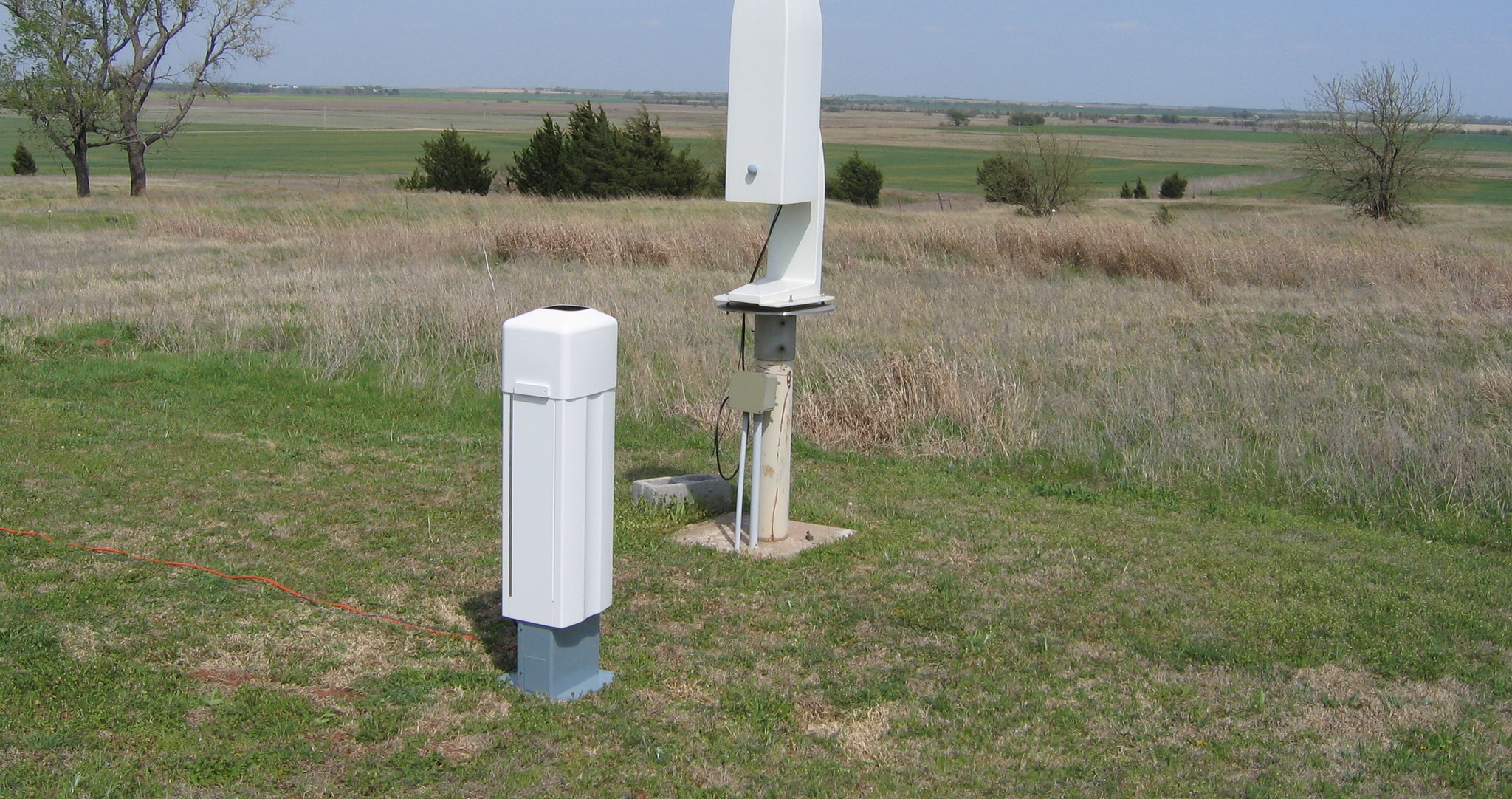 After a 3-day period of side-by-side operations and acceptance testing, the new CL31 ceilometer (foreground) officially replaced the older CT25K model on April 16, 2010 at the SGP site.